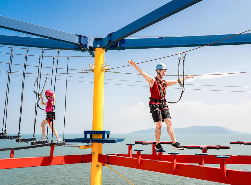 Genting Dream waterslides ropes course zipline activities