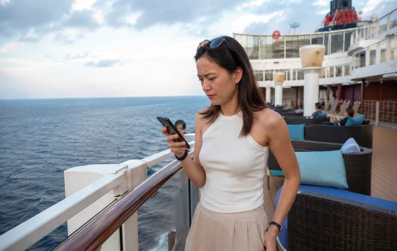 Using a phone on the Genting Dream deck at sea with limited connectivity